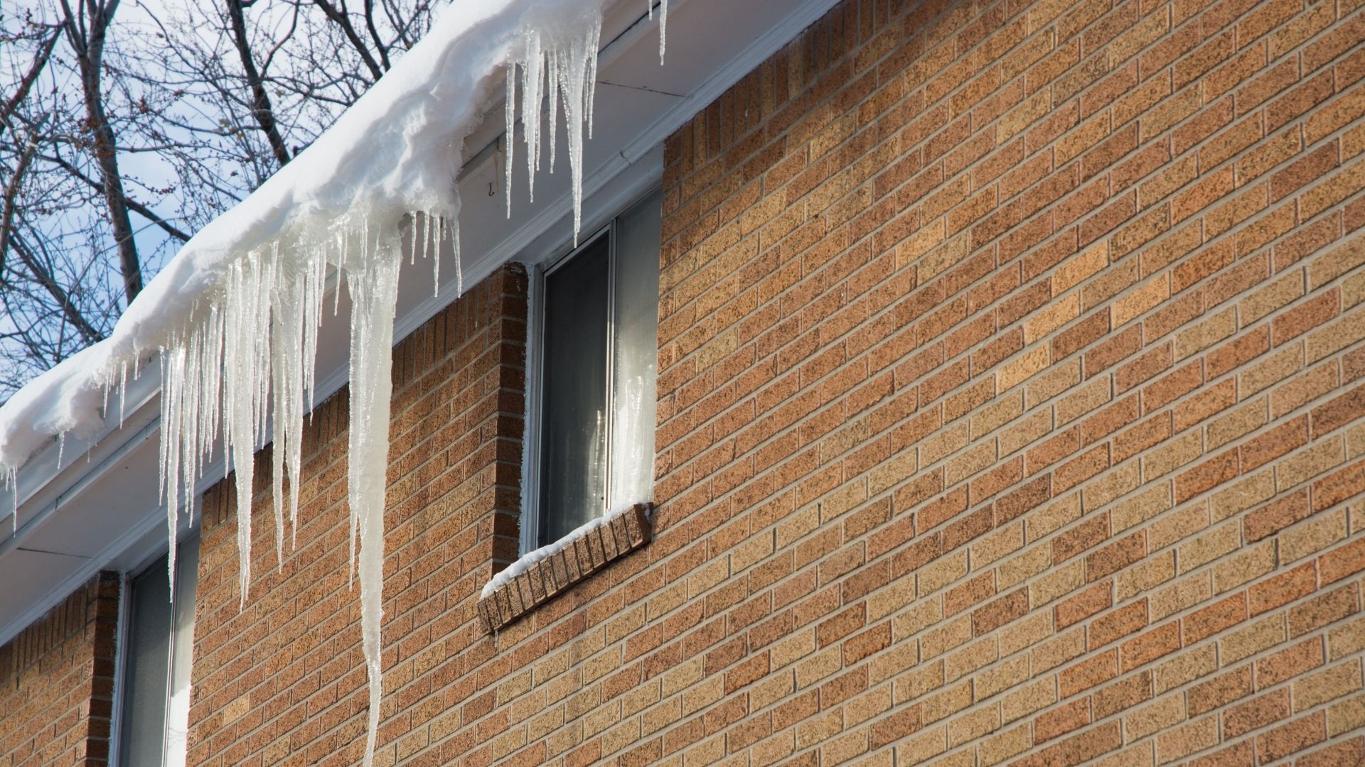 Why are icicles forming on my soffit